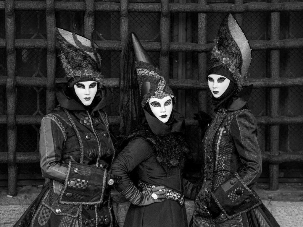 Fun, sex and culture: How to sell a fringe show experience. Three masked performers in elaborate traditional costumers.